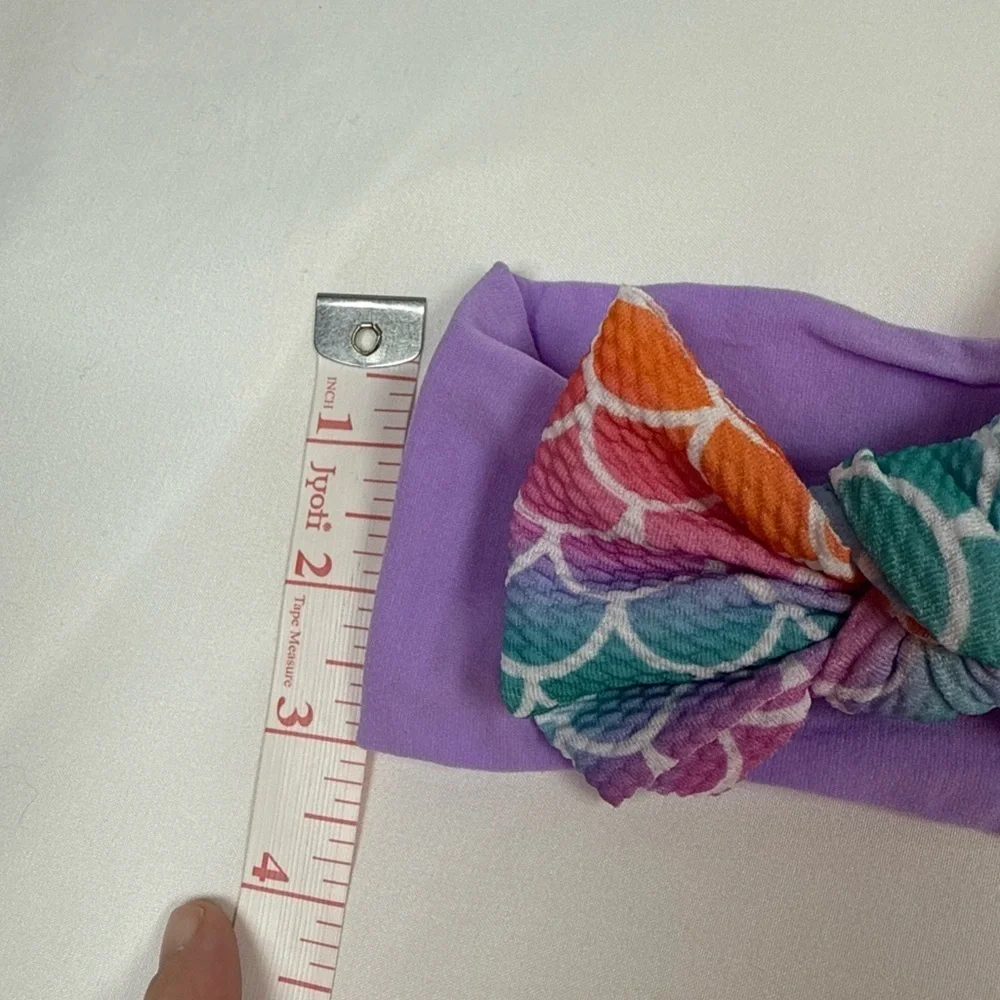 Vibrant Purple and Orange Hair Bow Accessory